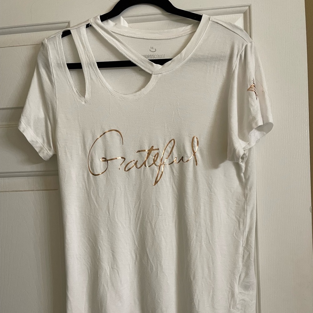 Graphic T with cut-outs. Size small